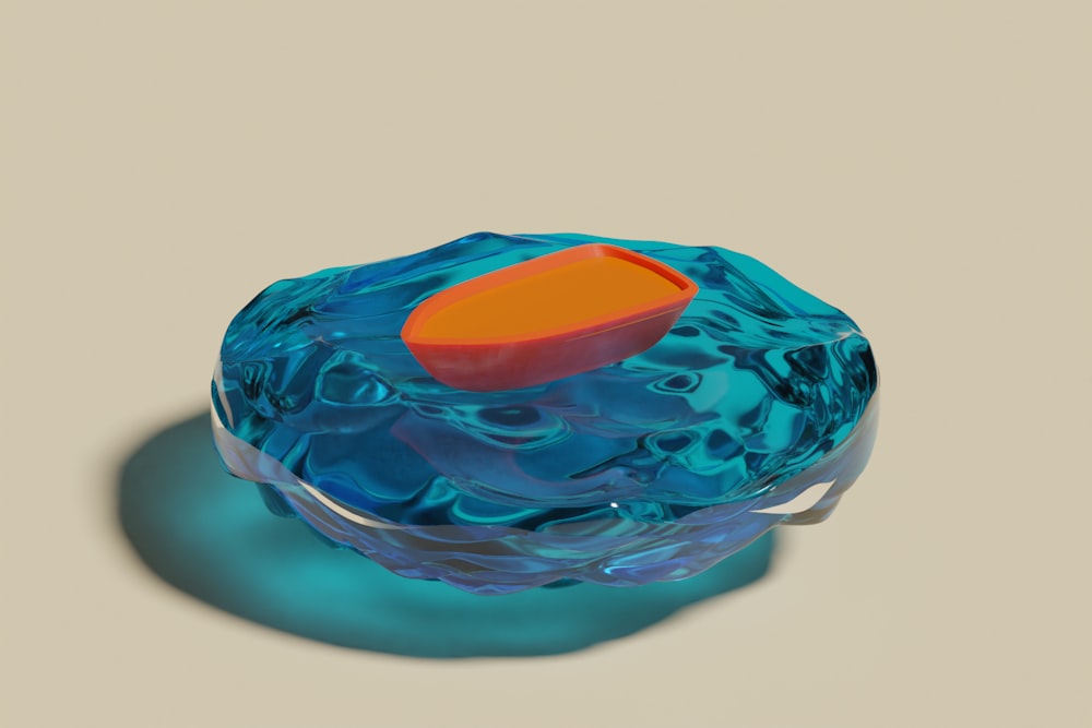 a blue and orange object sitting on top of a table