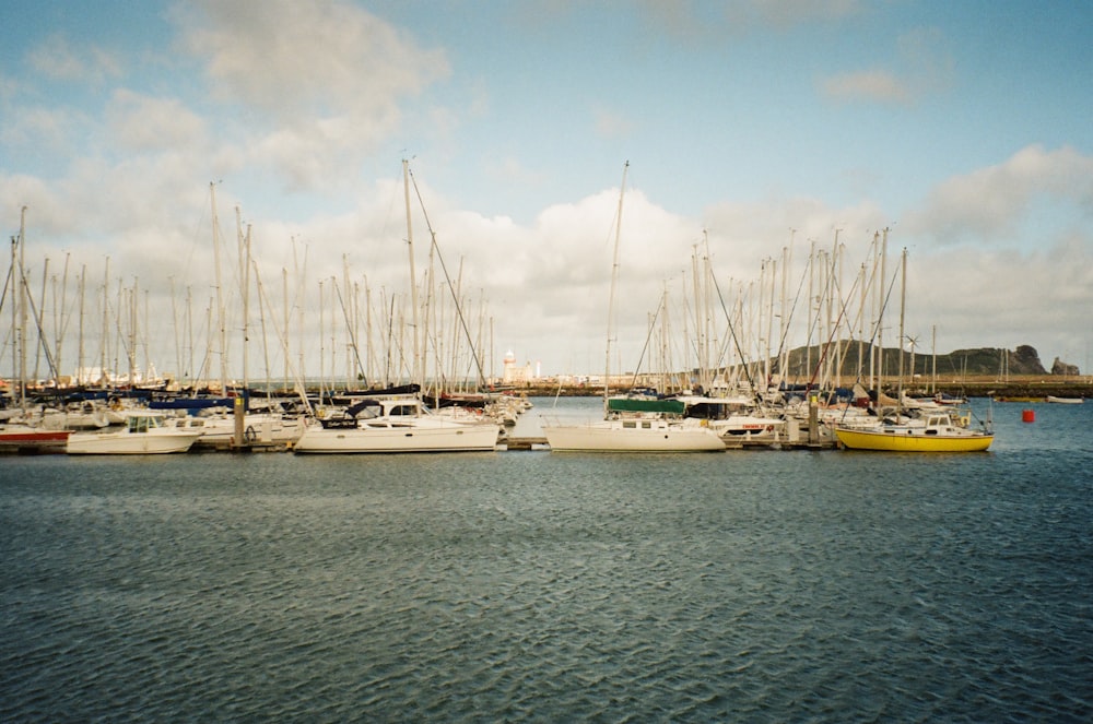 a bunch of boats that are sitting in the water