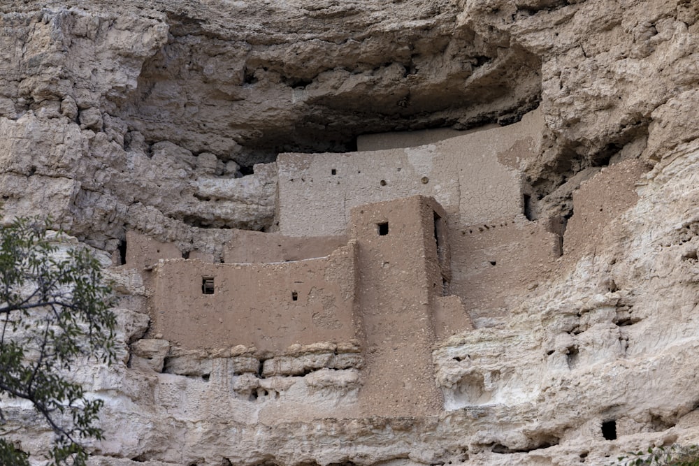 a cliff dwelling built into the side of a mountain