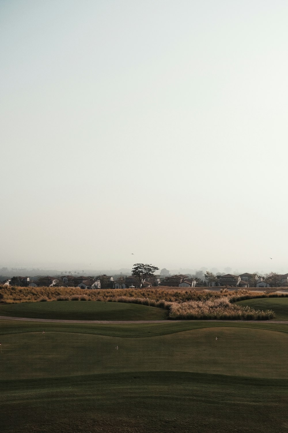 a view of a golf course from a distance