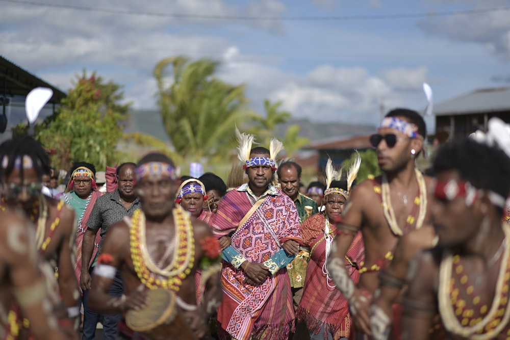 a group of people dressed in native clothing