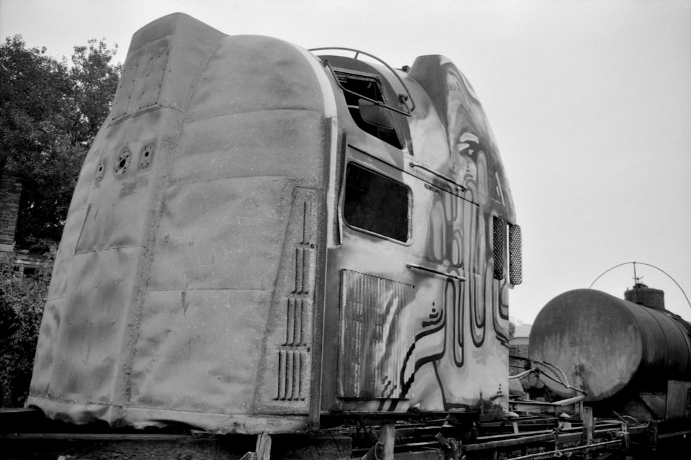 a black and white photo of an old train