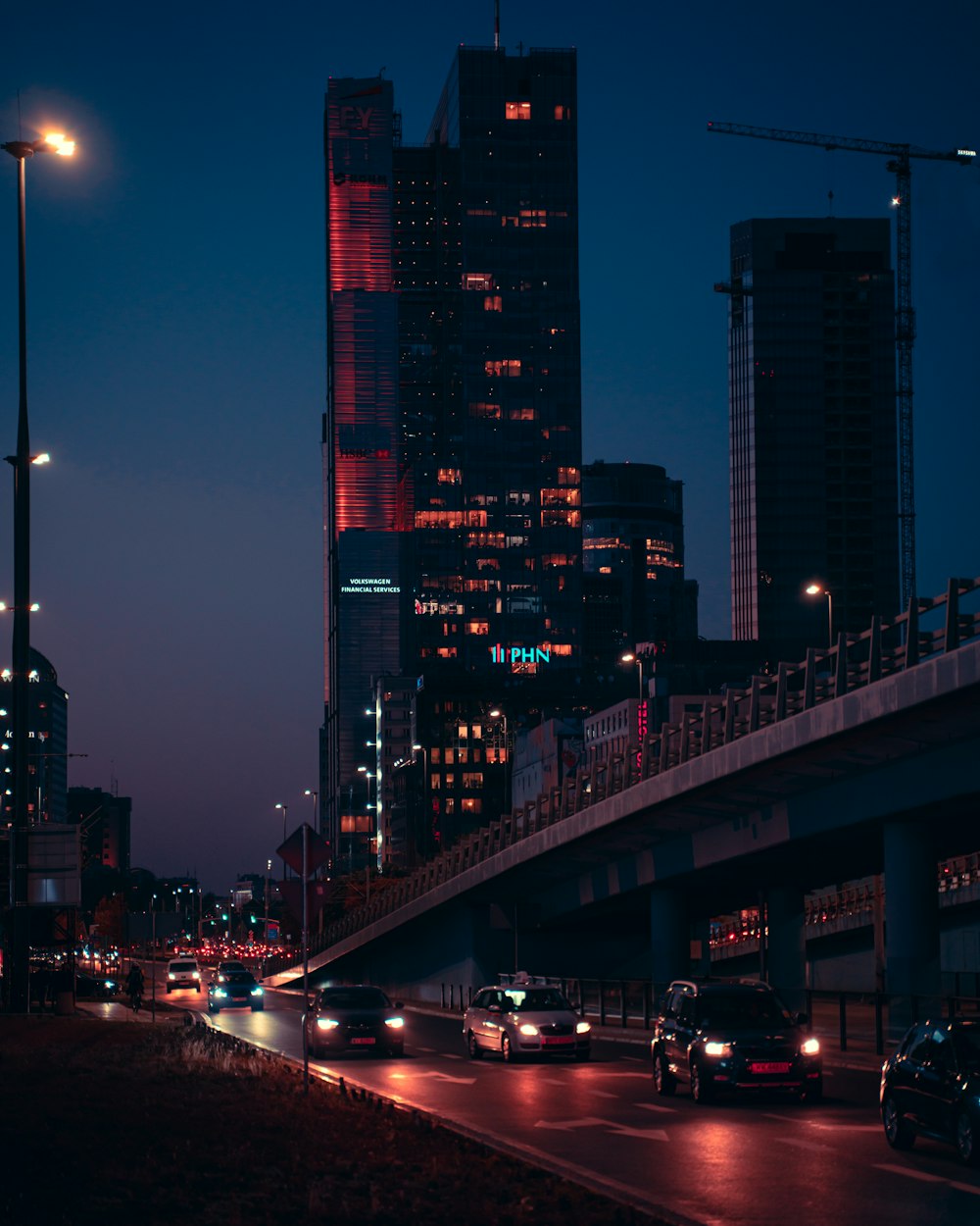 a city at night with a lot of traffic