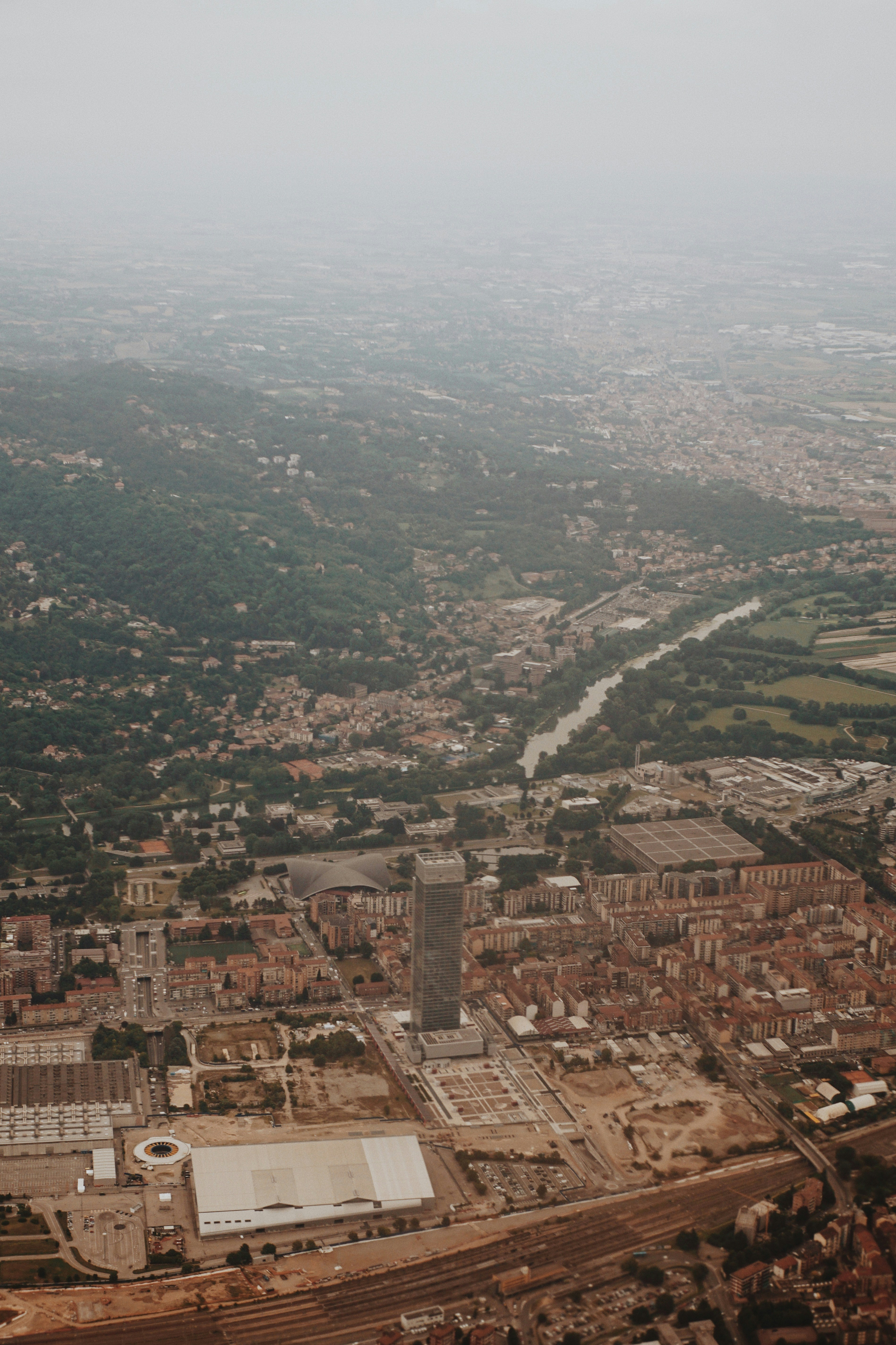 an aerial view of a city with a river running through it