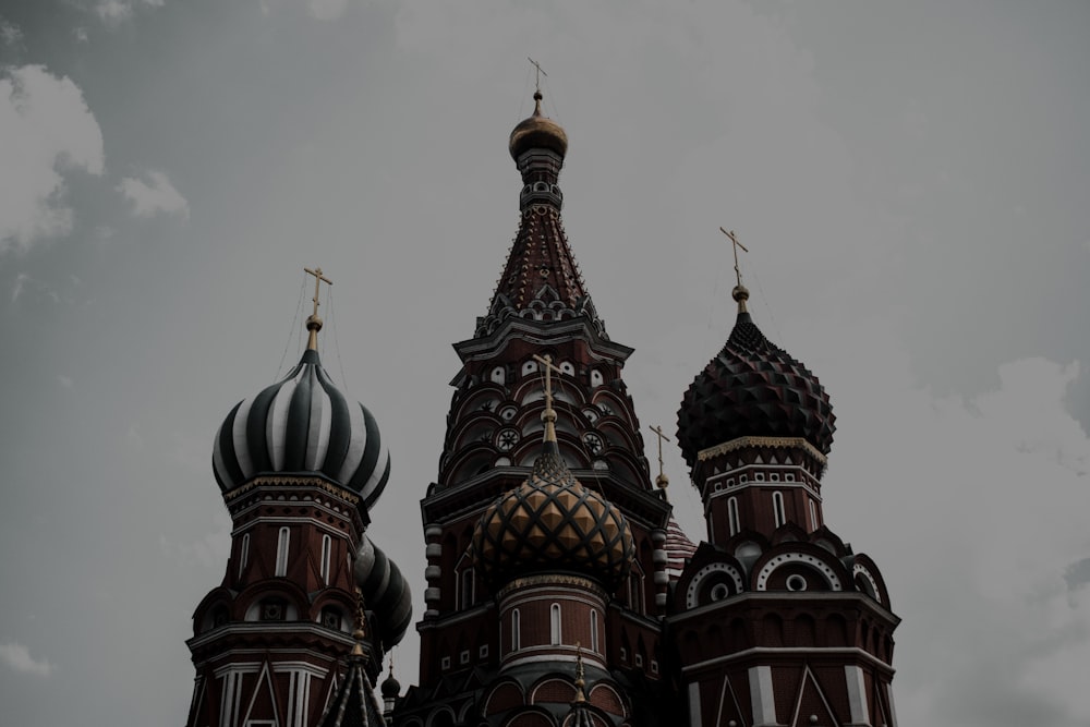 a very tall building with a clock on it's side