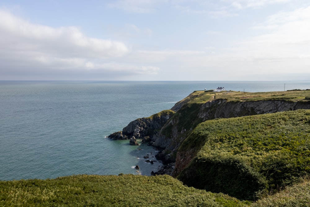 a view of a body of water from a cliff