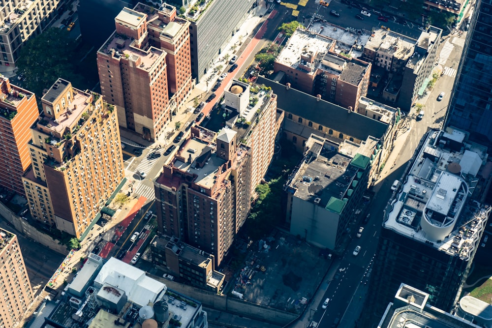 an aerial view of a city with tall buildings