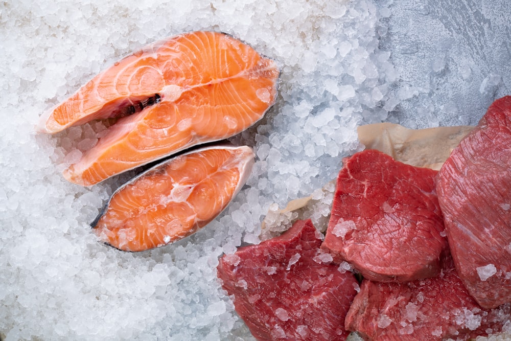 a pile of fish sitting on top of a pile of ice