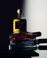 a bottle of perfume sitting on top of a table