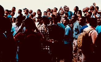 a group of people standing next to each other