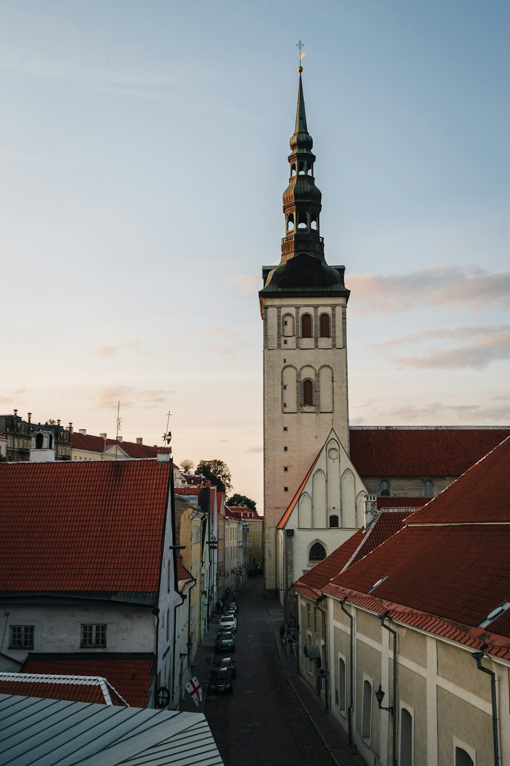 a tall clock tower towering over a city