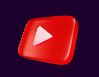 a red play button with a white arrow