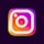 A colorful and glossy 3D representation of a familiar social media logo with a square shape featuring rounded edges and a stylized camera icon in the center. The logo has gradients of pink, purple, and orange with a shiny, reflective surface.