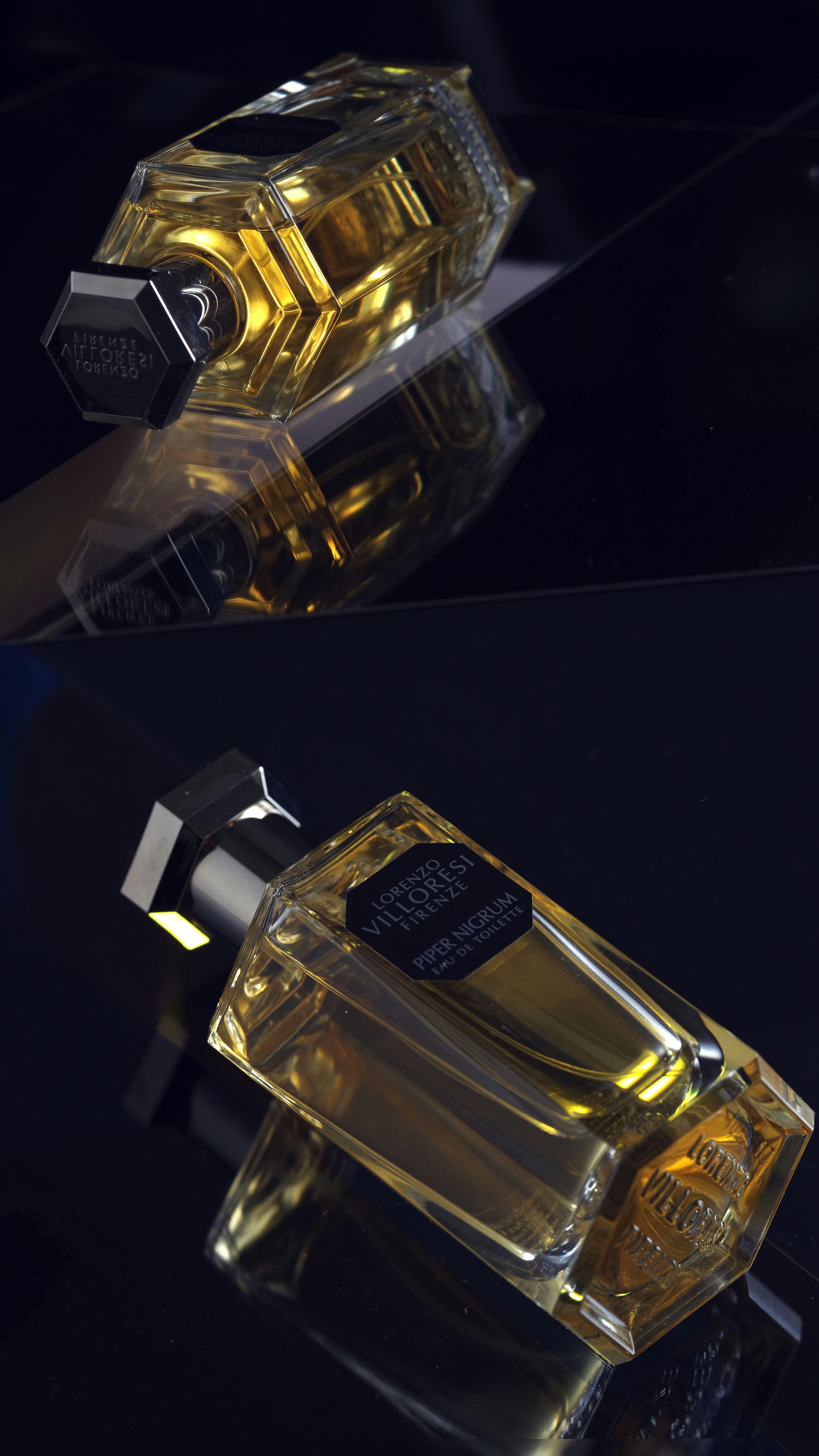 a bottle of cologne sitting on top of a table