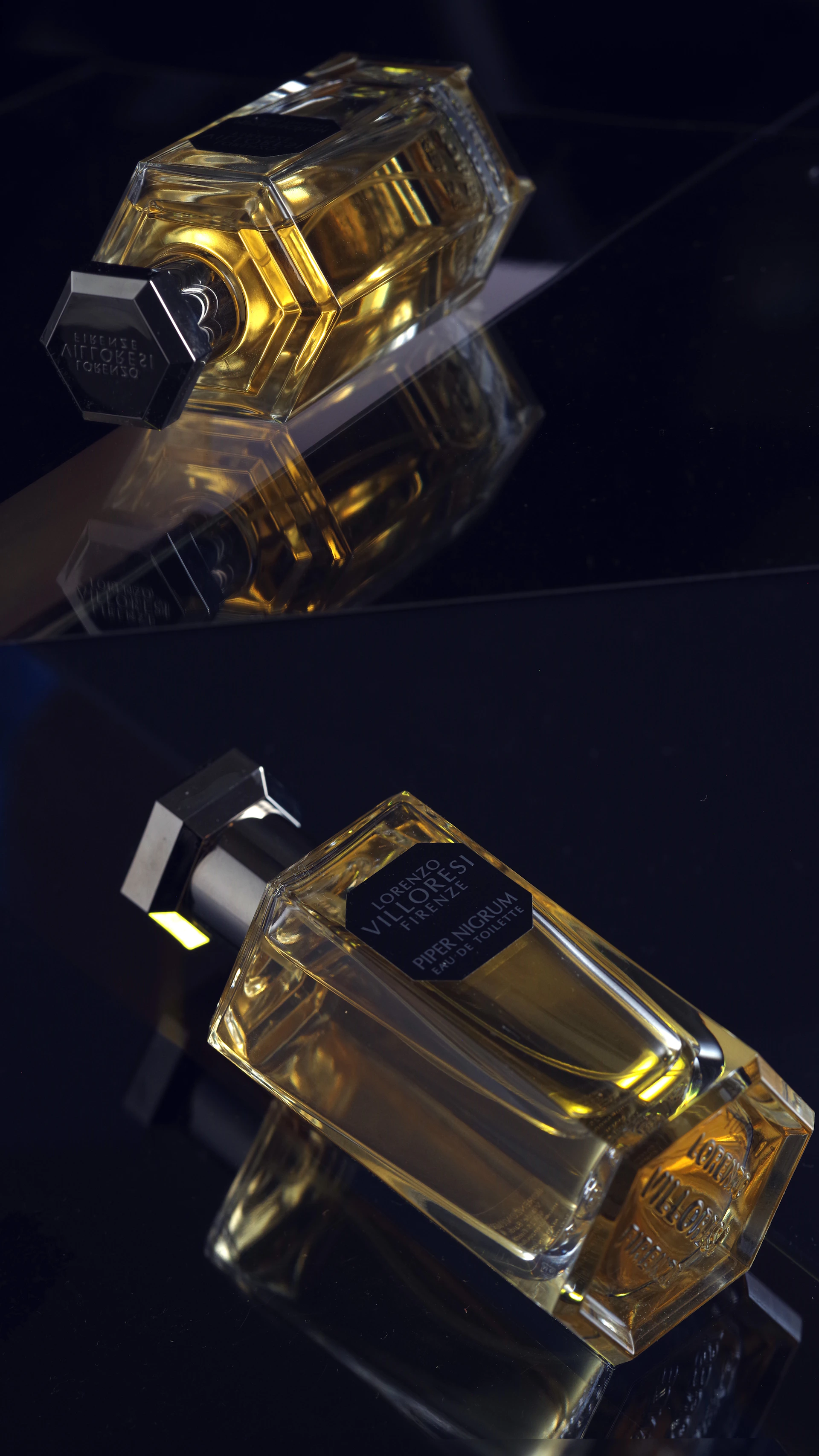 a bottle of cologne sitting on top of a table