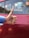 A happy customer giving a thumbs up in front of a transport vehicle.