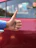 A happy customer giving a thumbs up next to a parking gate.