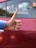 A satisfied customer giving a thumbs up in front of their home.
