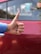 A happy customer giving a thumbs up in front of their garage.