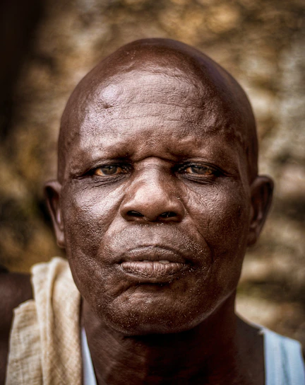 a close up of a person wearing a scarf