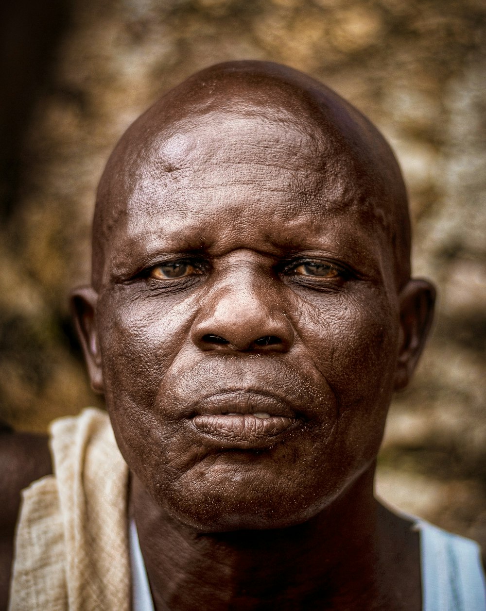 a close up of a person wearing a scarf