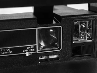 Close-up of vintage camera used by Nguxi dos Santos.