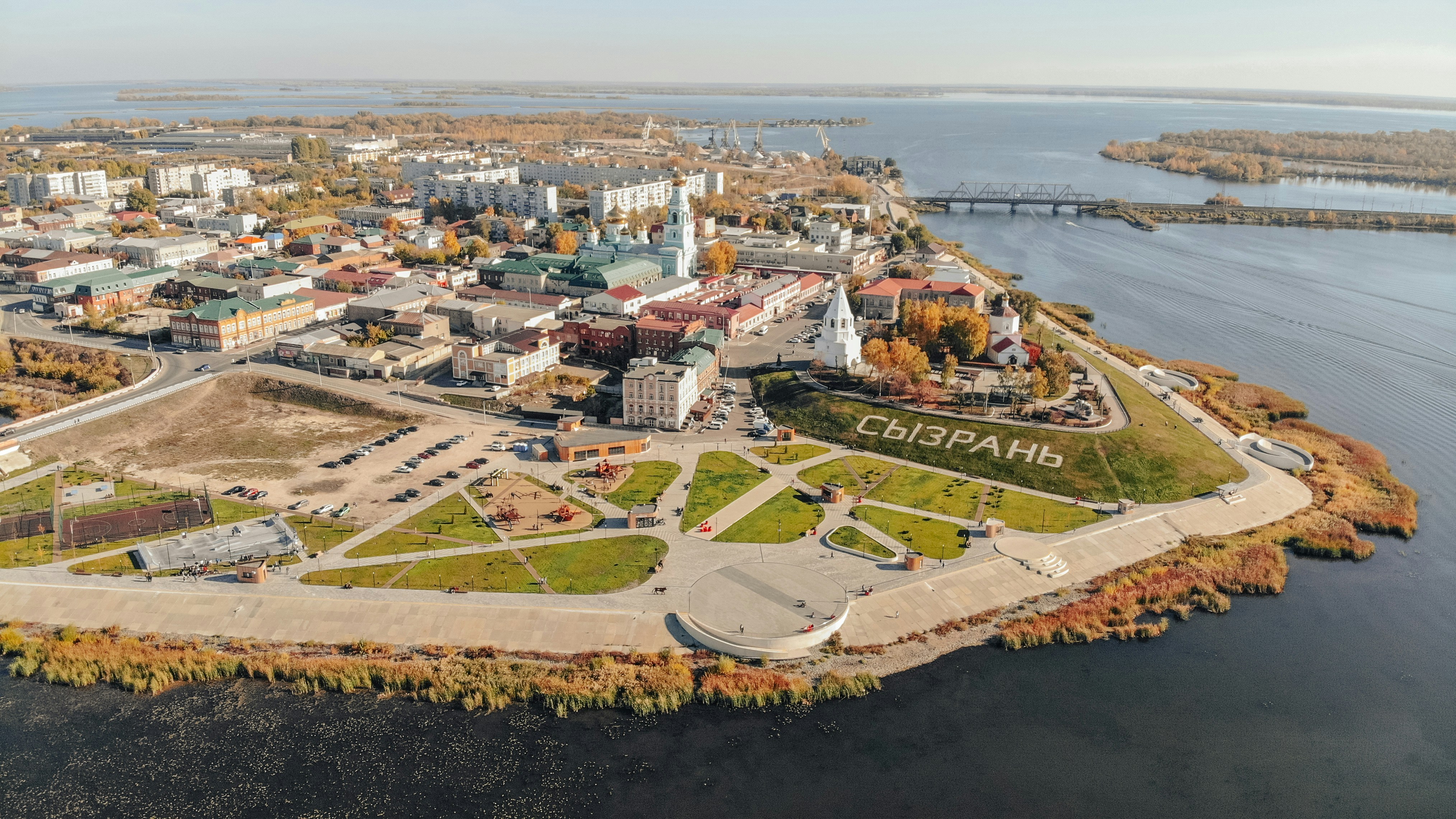 an aerial view of a city with a river running through it