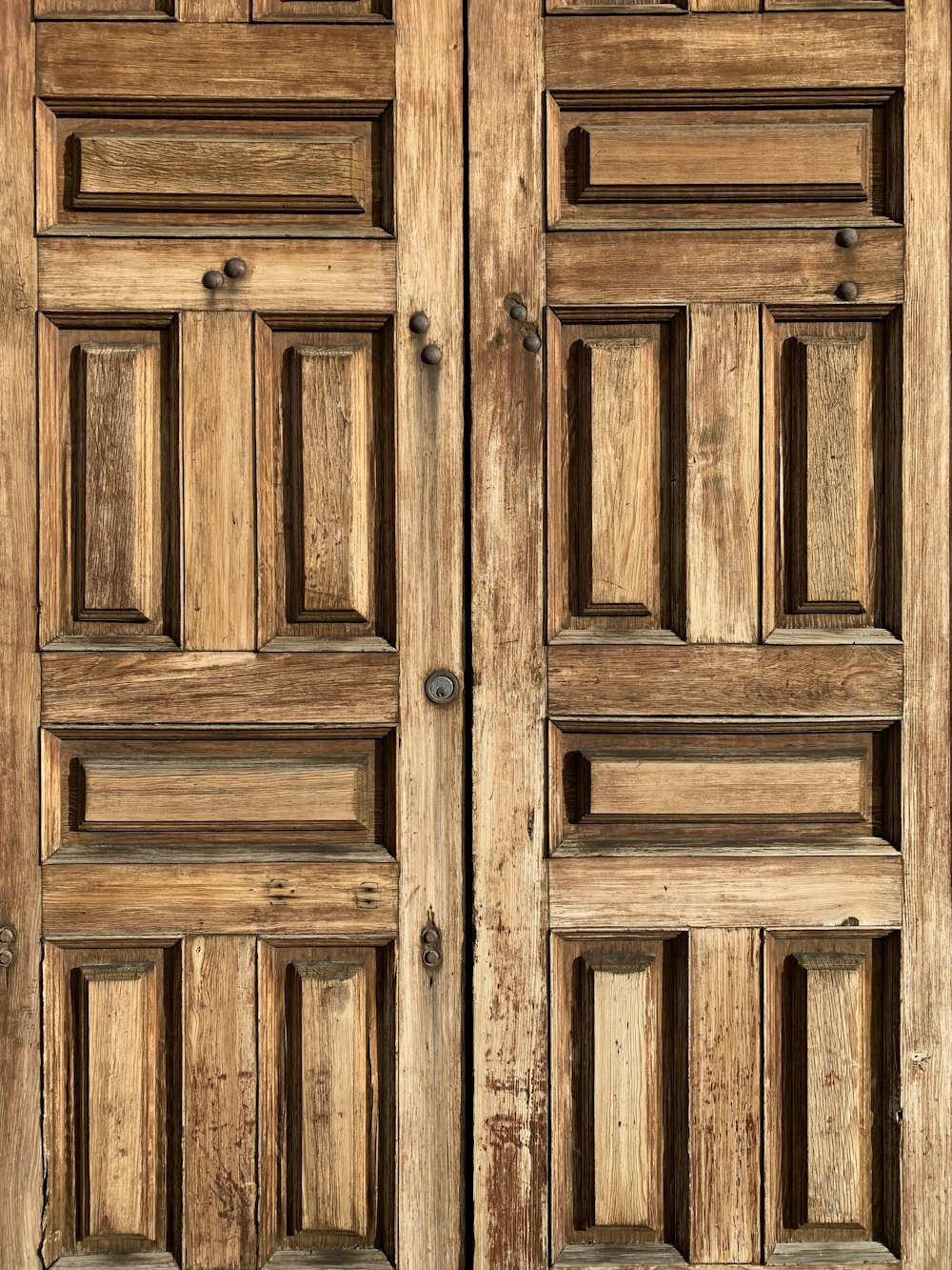 a close up of a wooden door with no glass