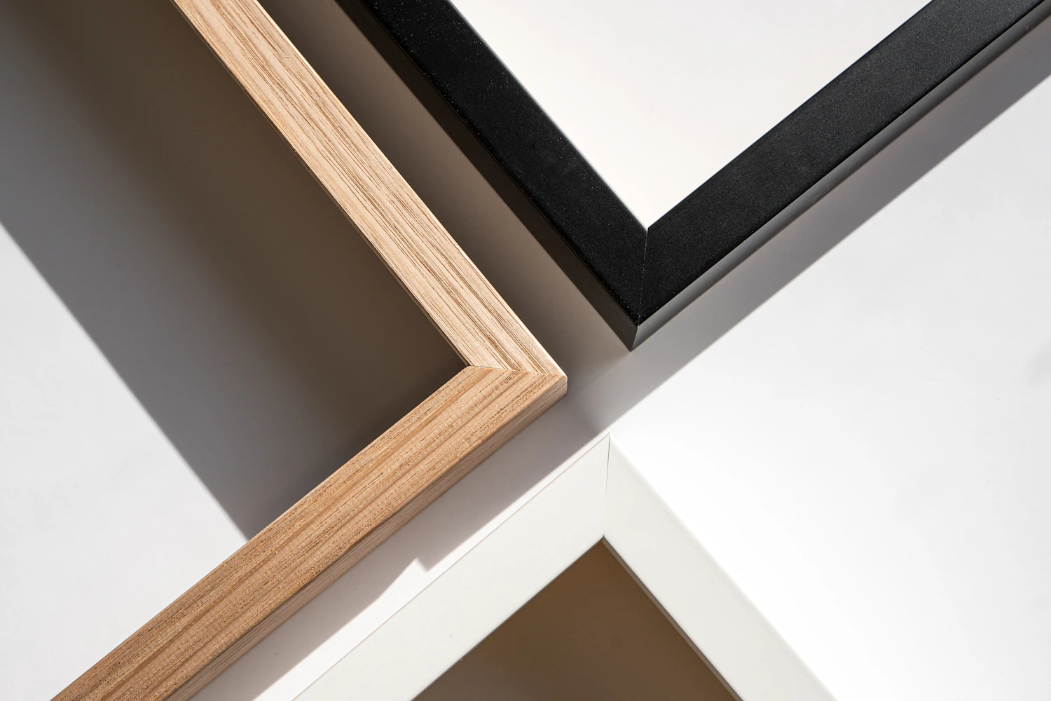 Close-up of oak, black and white frame corners