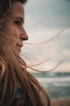 a close up of a person holding a cell phone