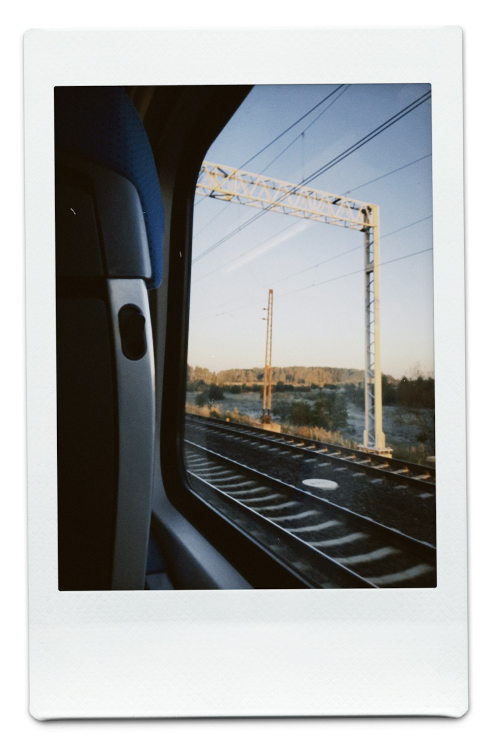 a picture taken from inside a car of a train