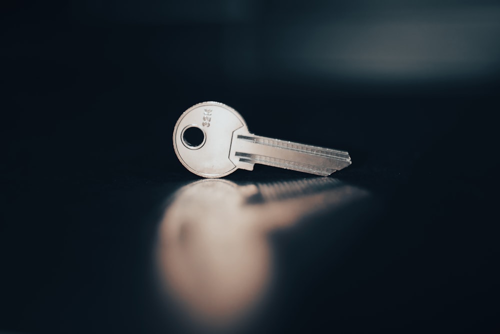a close up of a key on a table