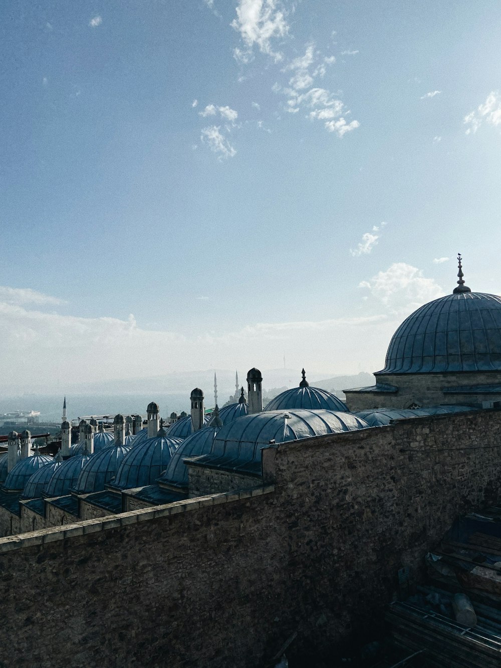 a view of a building with a sky background