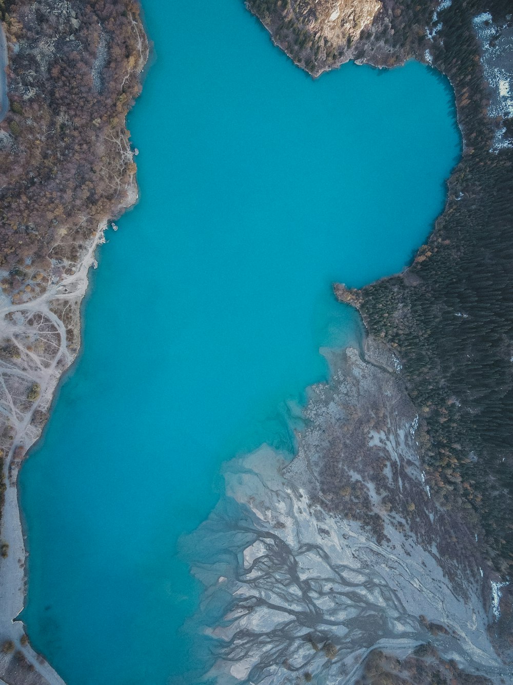 a large body of water surrounded by mountains