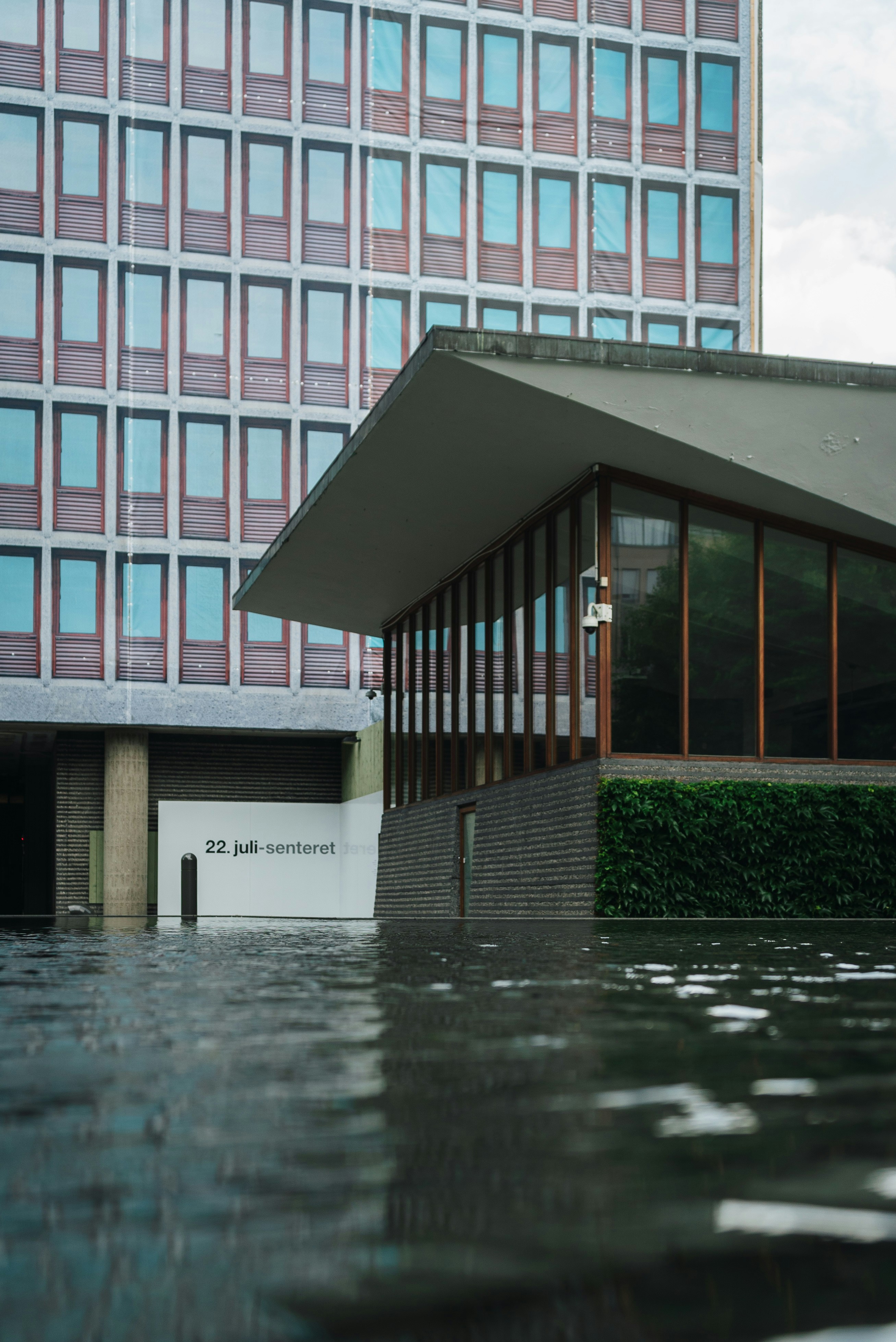a building that has some water in front of it