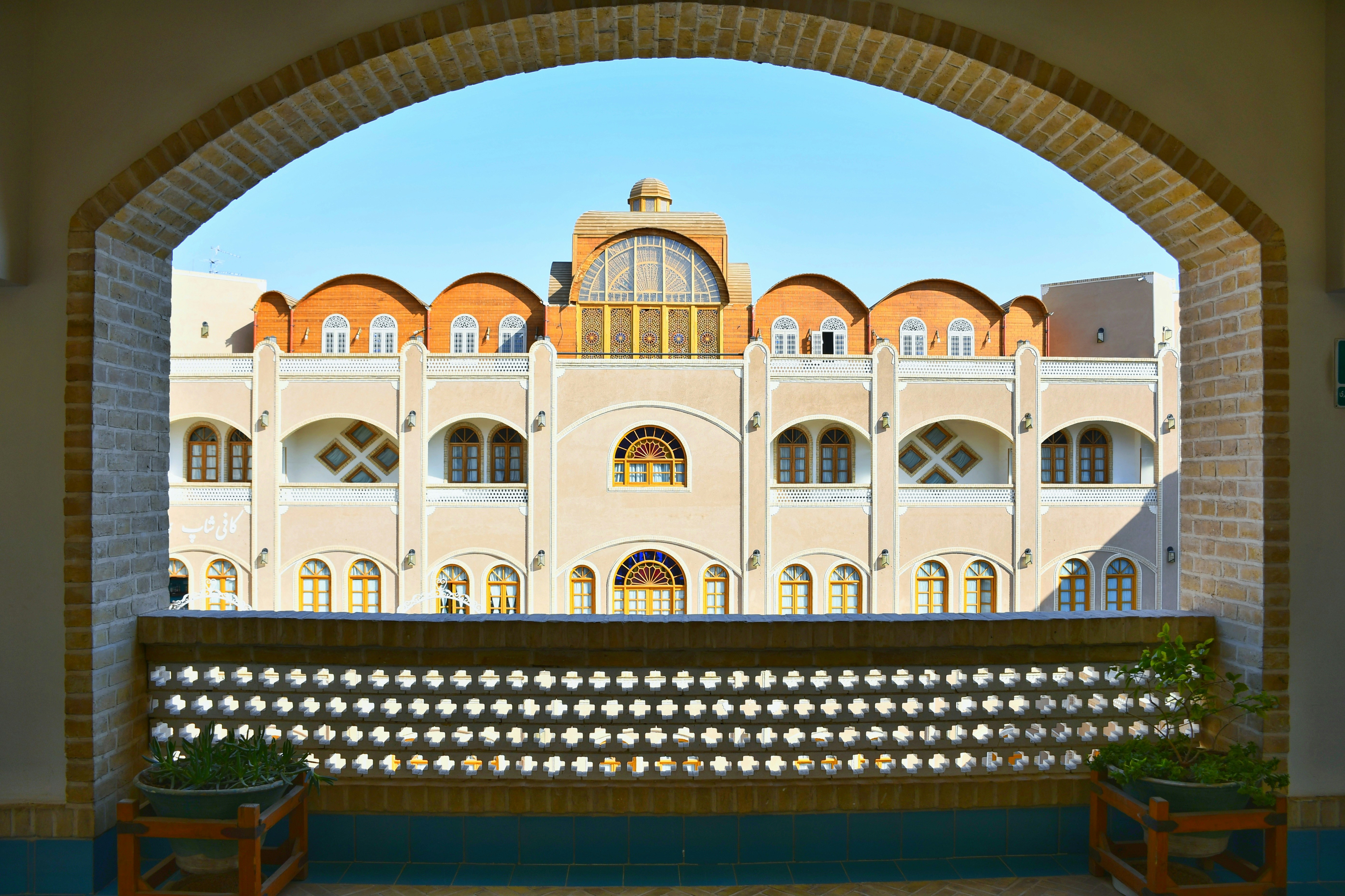 a view of a building through an archway