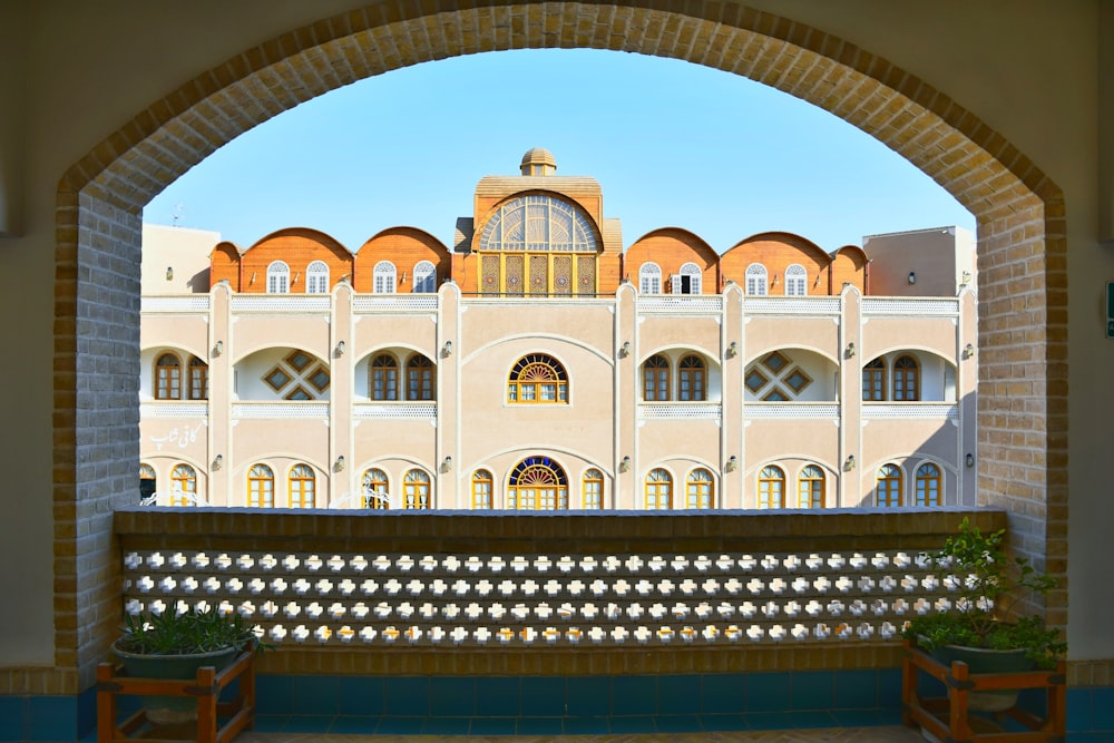 a view of a building through an archway