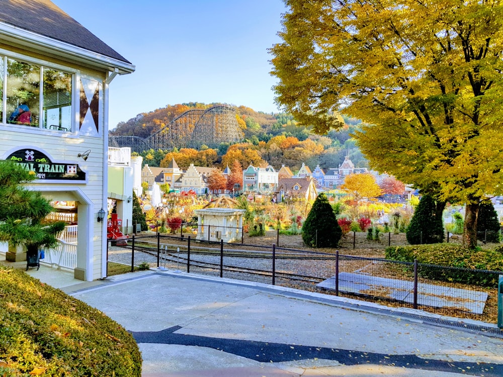 a scenic view of a small town in the fall