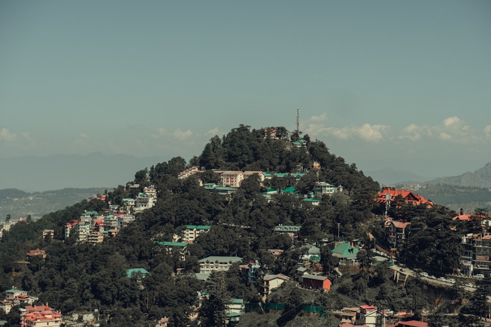 a hill with a small village on top of it