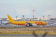 a large jetliner sitting on top of an airport runway