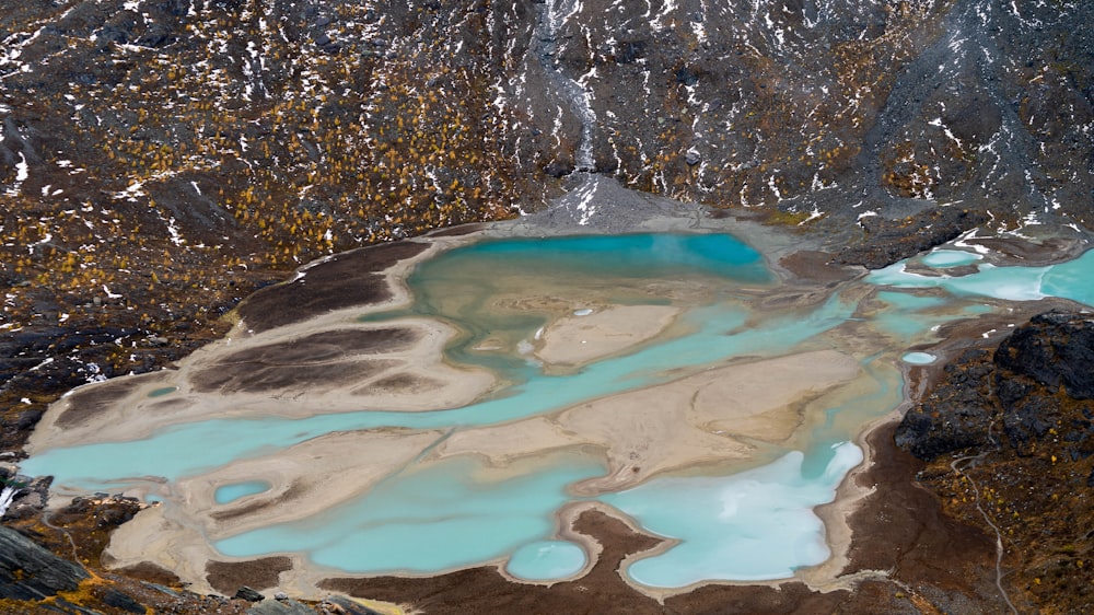 a large body of water surrounded by rocks