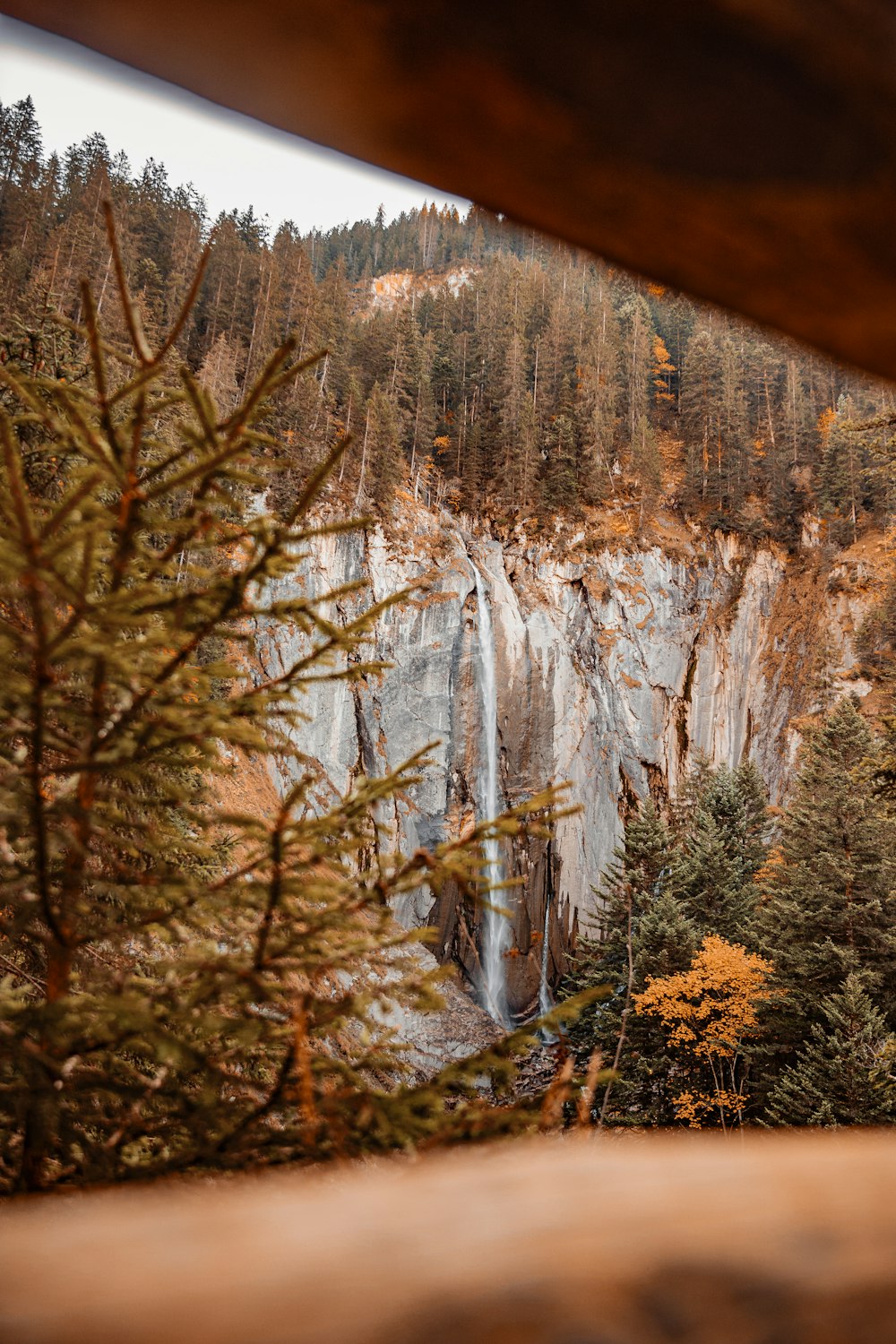 a view of a waterfall through a window