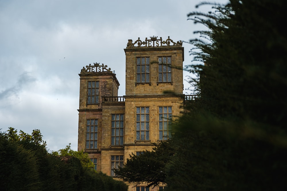 a tall building with a clock on the top of it