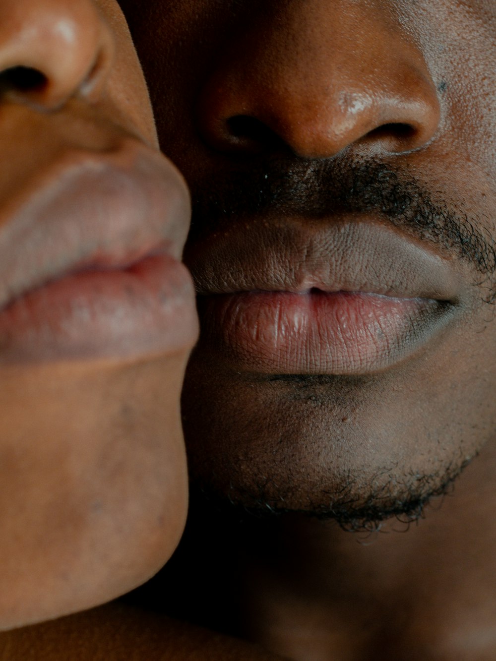 a close up of a person holding a cell phone