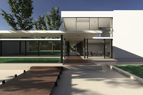 a modern house with a walkway leading to it