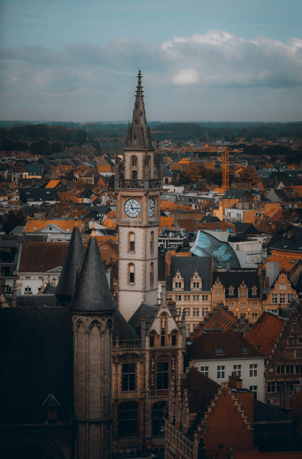 a large clock tower towering over a city