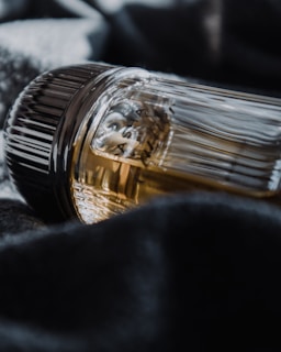 Close-up of grokchai recovery elixirs glowing softly on a porcelain surface