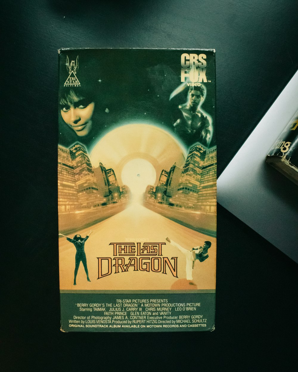 a dvd cover for the last dragon on a table