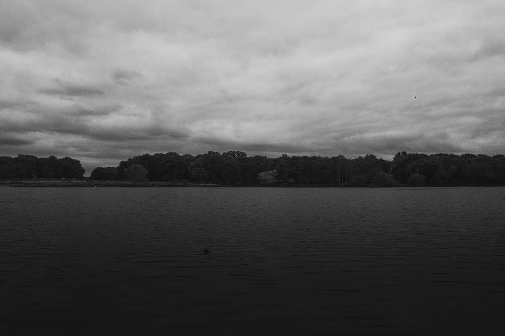 a black and white photo of a body of water