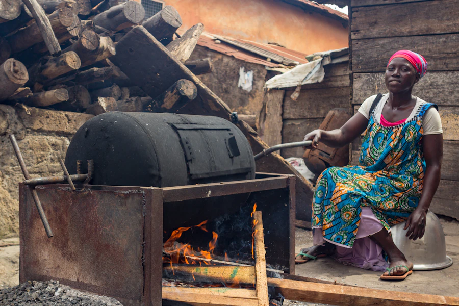 Woman cooking on traditional stove Africa clean cooking